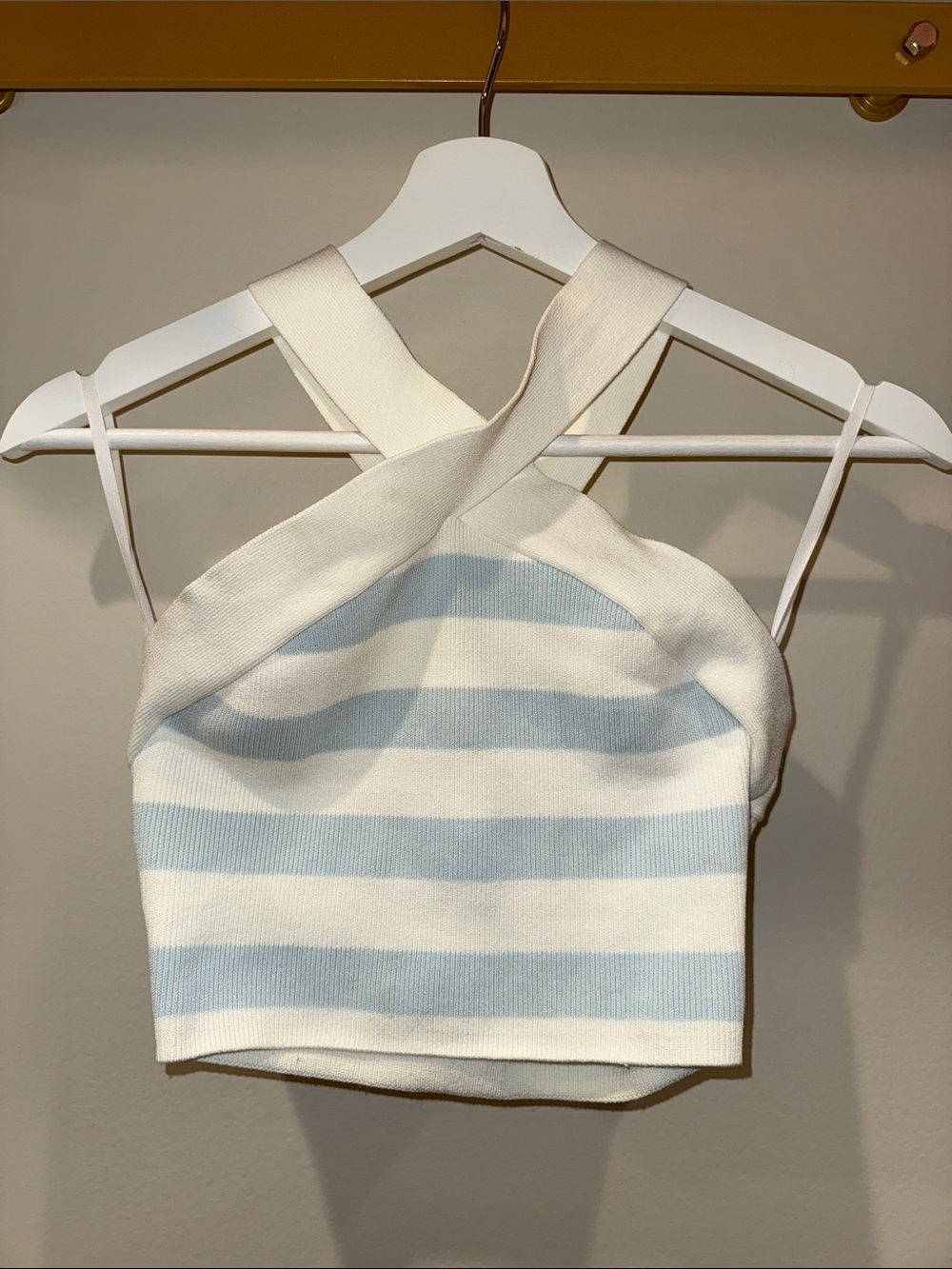 Aritzia Babaton Sculpt Knit Criss-Cross Tank in a blue and white striped